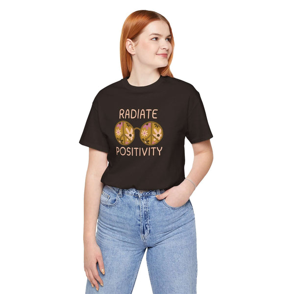 Unisex Radiate Positivity tee featuring vibrant floral glasses, promoting kindness and good vibes.