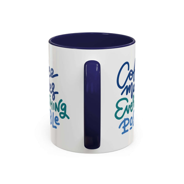 Coffee Makes Everything Possible Mug with navy interior and handle, featuring hand-lettered script design.