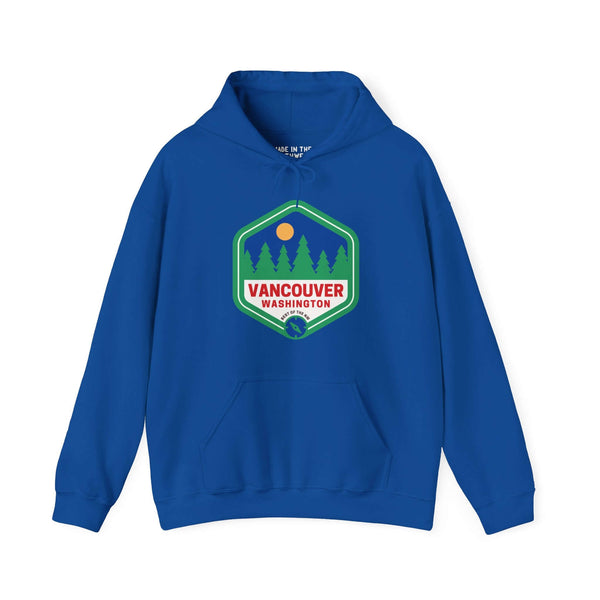 Blue retro Vancouver hoodie with 90s-inspired badge featuring trees, celebrating the Northwest's natural charm and community spirit.