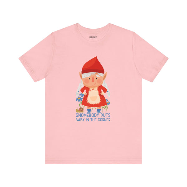 Gnomebody Puts Baby in the Corner pink tee featuring a whimsical female gnome and playful text.