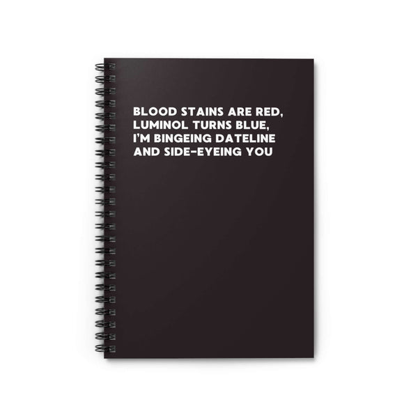 Black spiral notebook with poem "Blood stains are red, Luminol turns blue, I'm bingeing Dateline and side-eyeing you".