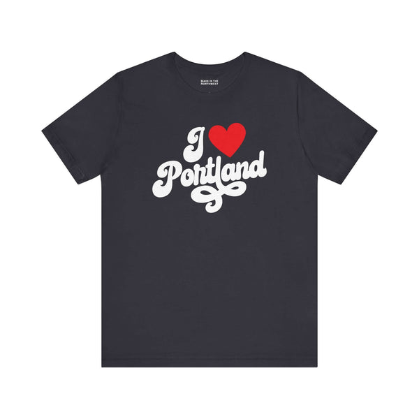 I love Portland t shirt with cursive design on a dark background, celebrating Oregon's hometown pride.