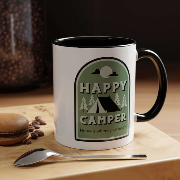 Happy Camper Mug featuring a tent, pine trees, and a moon on a glossy ceramic surface.