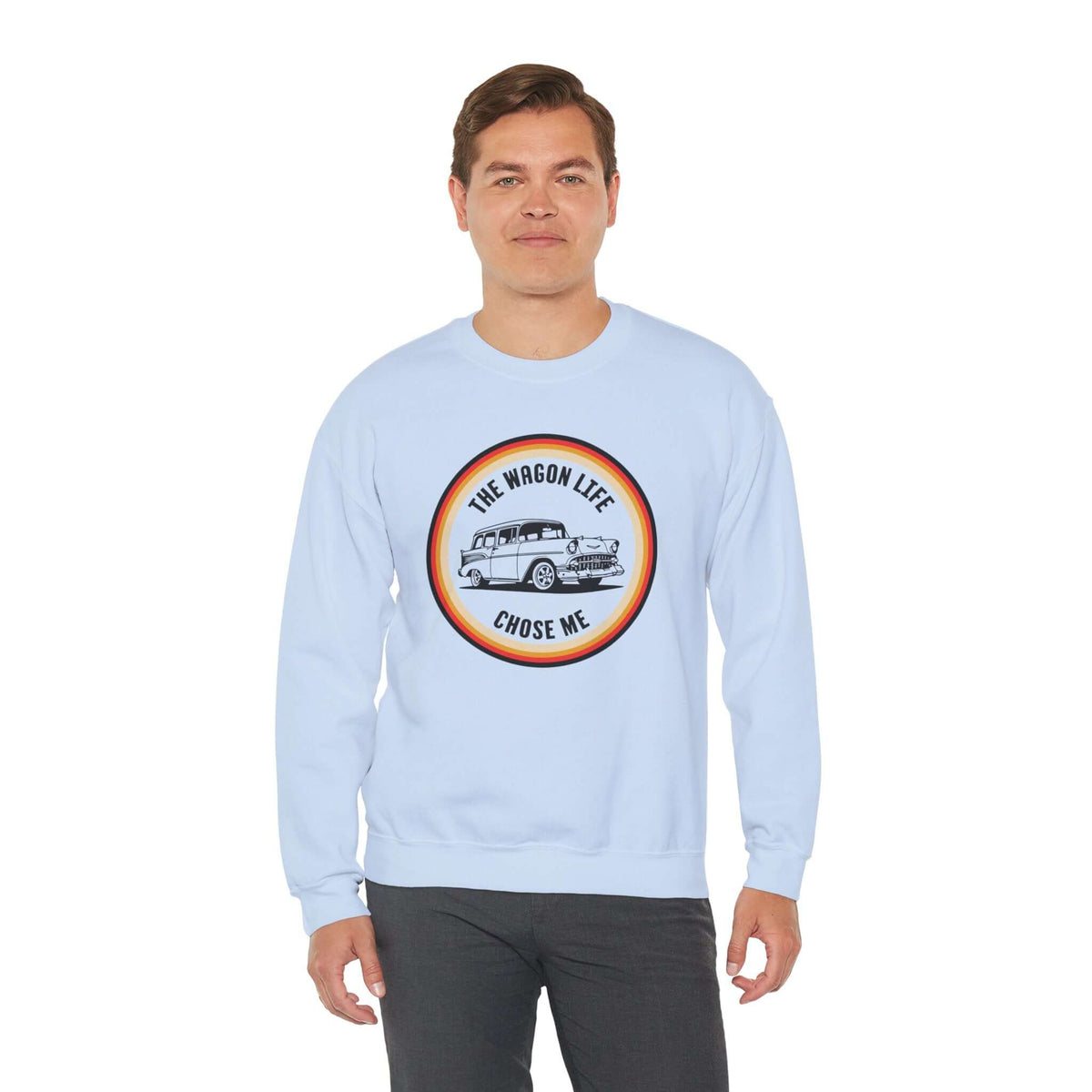 Model wearing The Wagon Life Chose Me cozy sweatshirt featuring a vintage Chevy Nomad design.