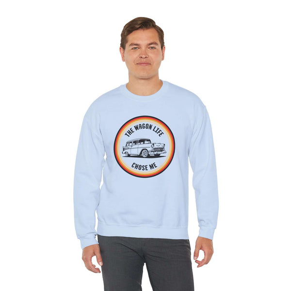 Model wearing The Wagon Life Chose Me cozy sweatshirt featuring a vintage Chevy Nomad design.