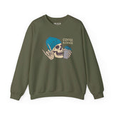 Olive green sweatshirt featuring a skeleton with coffee and chaos theme, ideal for caffeine-loving, rebellious spirits.