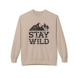 Stay Wild sweatshirt featuring a vintage mountain and trees graphic on a cozy crewneck.