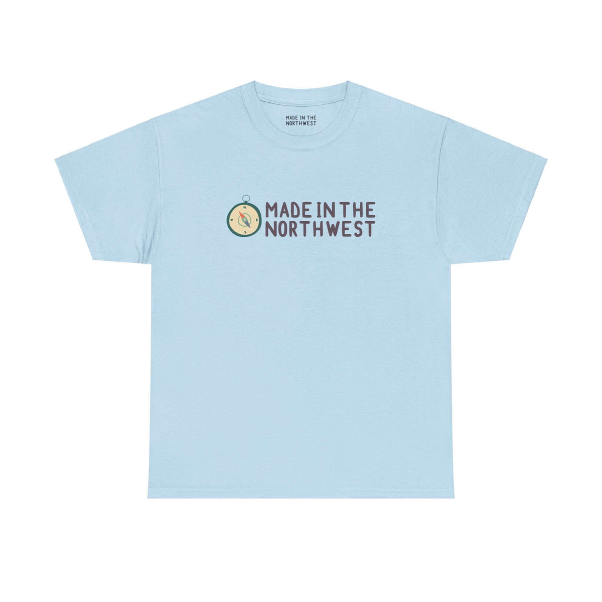 Light blue tee with 'Made in the Northwest' logo and compass design, showcasing Pacific Northwest pride.