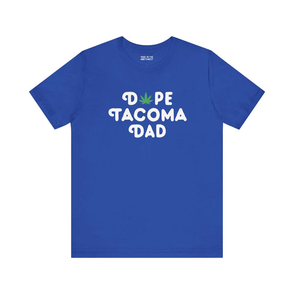 Blue "Dope Tacoma Dad" tee with marijuana leaf design, perfect for cool dads in Washington embracing local style.