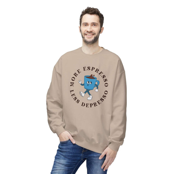 Man wearing a More Espresso Less Depresso sweatshirt in a light brown color with a cheerful coffee mug design.