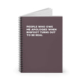Spiral notebook titled 'People Who Owe Me Apologies When Bigfoot Turns Out to Be Real' on a dark background.