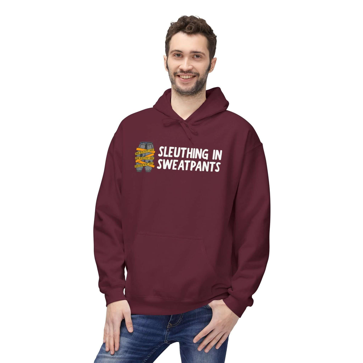 Man wearing a maroon hoodie that says 'SLEUTHING IN SWEATPANTS', perfect for cozy nights and casual adventures.