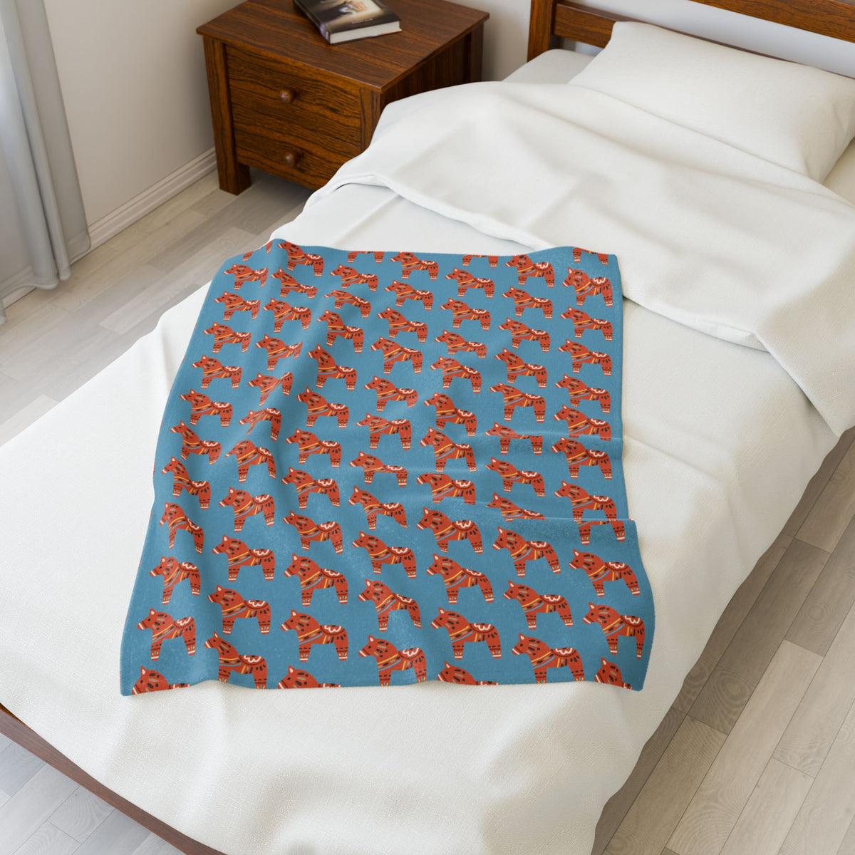Dala Horse Blanket – Scandi Spirit Lightweight Cozy Throw spread on a bed showcasing colorful Dala horses design.