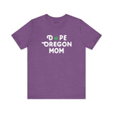 Purple 'Dope Oregon Mom' tee with marijuana leaf replacing the 'O' in 'Dope', celebrating cool moms and Oregon pride.