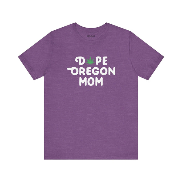 Purple 'Dope Oregon Mom' tee with marijuana leaf replacing the 'O' in 'Dope', celebrating cool moms and Oregon pride.