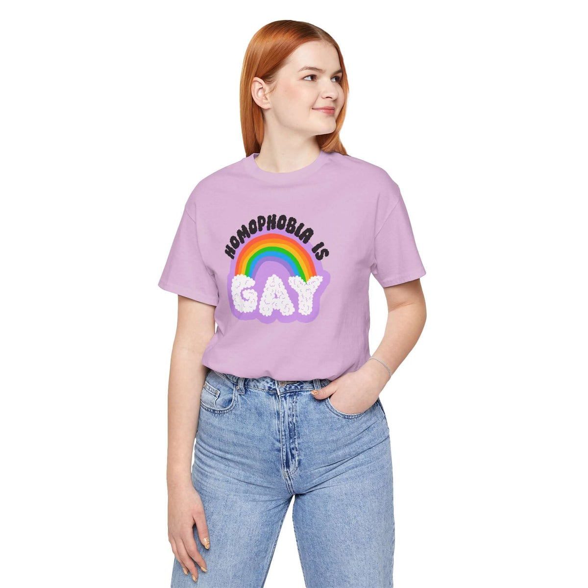 Homophobia Is Gay T Shirt – Bold Rainbow Pride Tee worn by model with a smile, showcasing vibrant rainbow design.