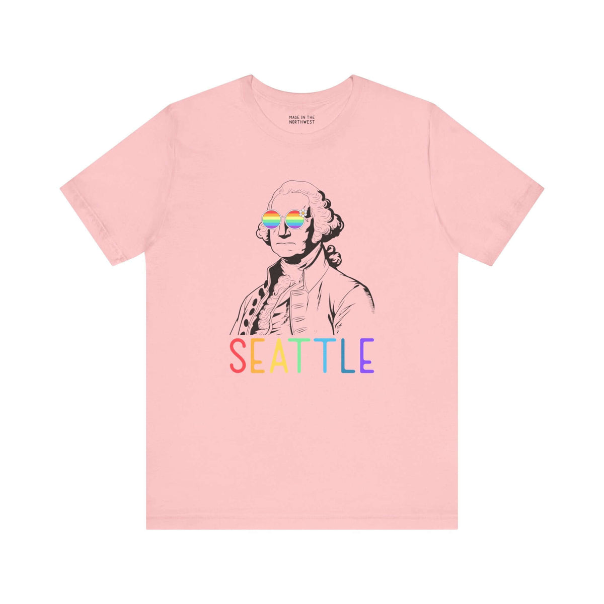 Pink Seattle tee with Rainbow Vision, featuring George Washington in rainbow glasses and colorful lettering, celebrating Pride.