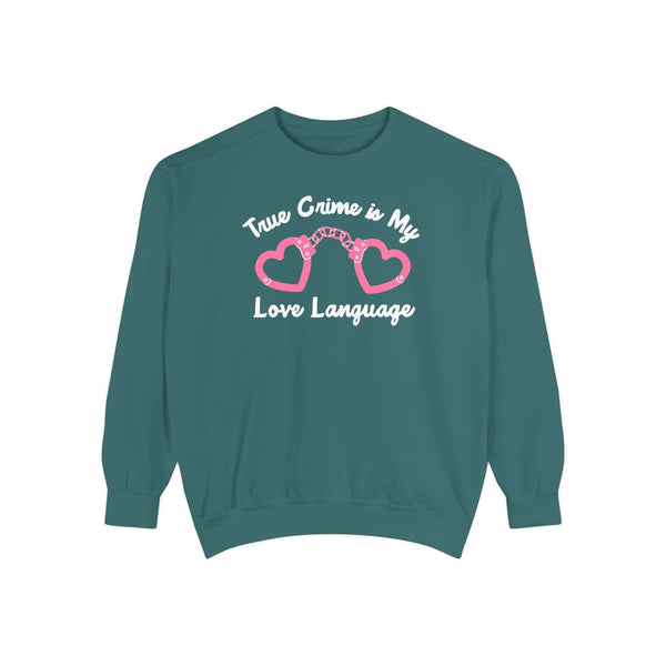 True Crime Is My Love Language Sweatshirt featuring heart-shaped handcuffs design on a teal background.