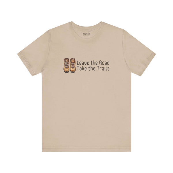Premium soft tee featuring 'Leave the Road, Take the Trails' design, perfect for outdoor adventures.