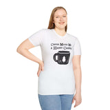 Model wearing Happy Camper Coffee Softstyle T-Shirt with cup graphic, perfect for outdoor coffee lovers.