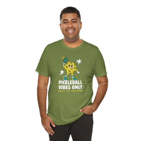 Man wearing Pickleball Vibes Only T Shirt with retro pickleball graphic, celebrating the sport's fun energy.