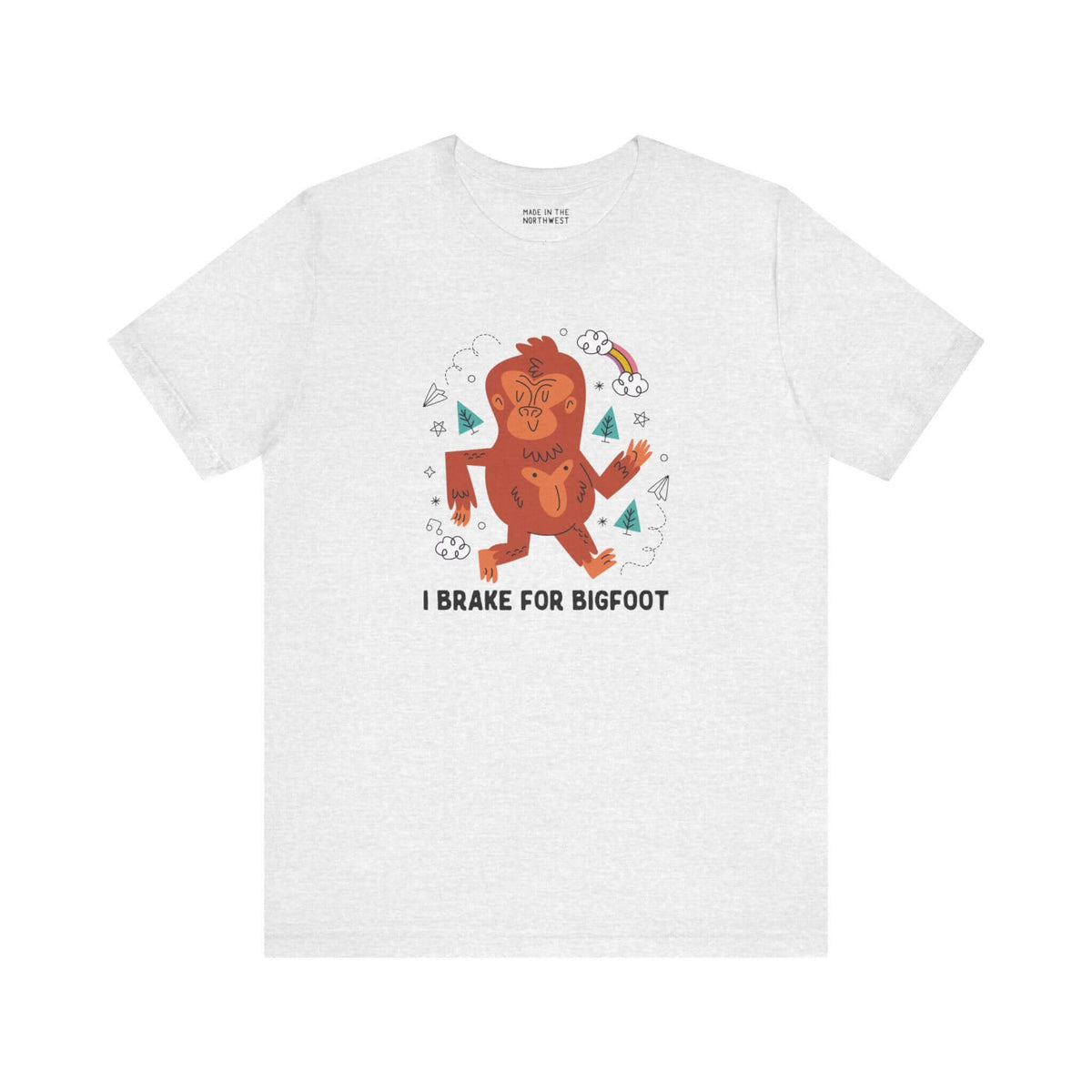 I Brake for Bigfoot Soft Tee Show your playful side and love for local folklore with our "I Brake for Bigfoot" Sasquatch Tee. This fun design features the phrase "I Brake for Bigfoot" alongside a whimsical graphic of a Sasquatch, perfect for those who enj