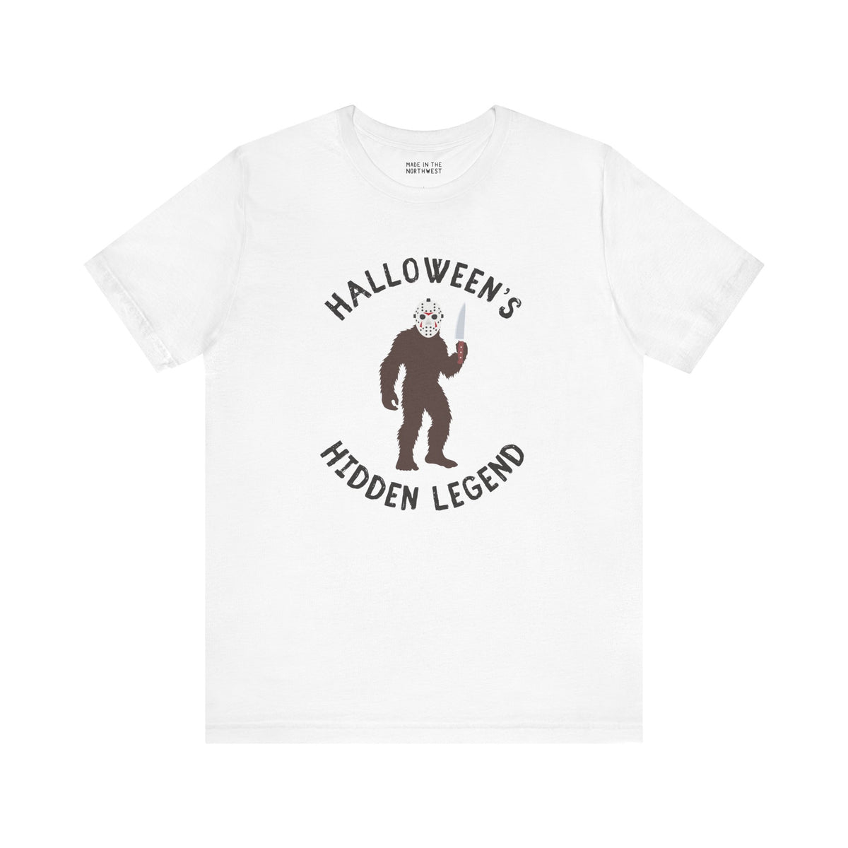 Bigfoot Halloween tee featuring a creature in a mask holding a knife, perfect for spooky season and Sasquatch fans.