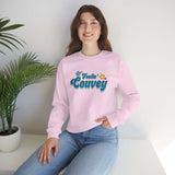 Model wearing pink Feelin' Couvey retro sweatshirt with floral design, showcasing Vancouver's vibrant spirit.