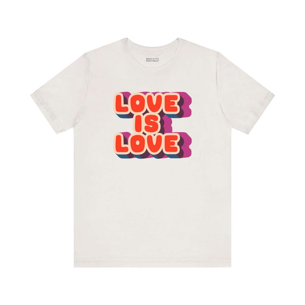 Love Is Love T Shirt with retro colorful graphics showcasing a joyful message of pride and positivity.