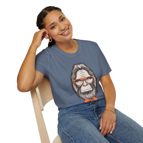Woman wearing Gentleman of the Woods Bigfoot T-shirt featuring a stylish Sasquatch with glasses and a bowtie.