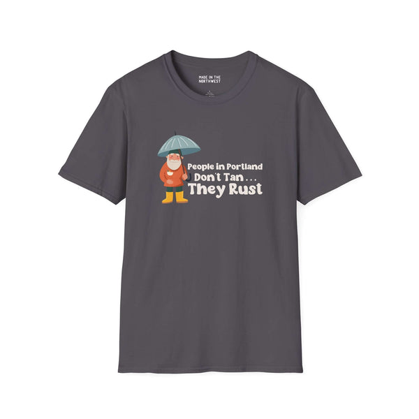 Gray t-shirt featuring "People in Portland Don't Tan, They Rust" graphic with character holding an umbrella.