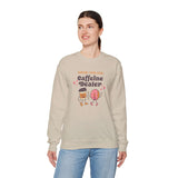Woman wearing beige Support Your Local Caffeine Dealer sweatshirt featuring playful coffee-themed design.