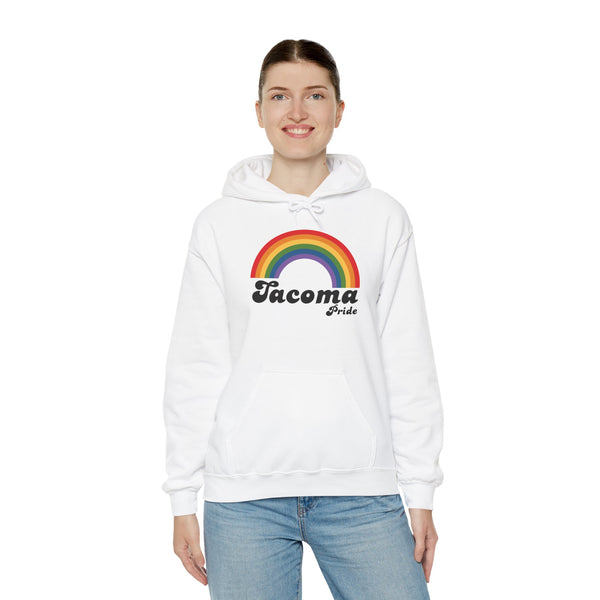 Model wearing white Retro Rainbow Tacoma Pride Cozy Hoodie with vibrant rainbow design.