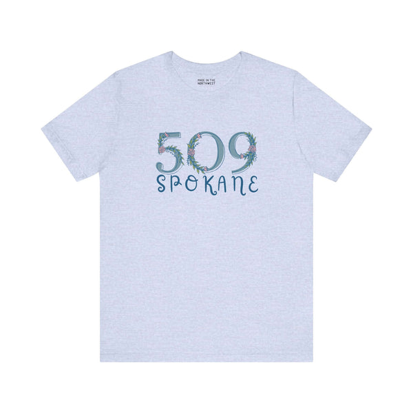 Light gray women's tee with 509 Spokane floral design, showcasing Pacific Northwest pride and comfort.