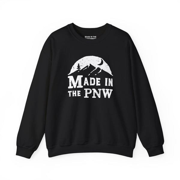 Made in the PNW sweatshirt showcasing a distressed mountain design on a black crewneck.