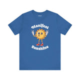 Manifest Sunshine T Shirt featuring a cheerful cartoon sun with peace signs and hand-lettered text.