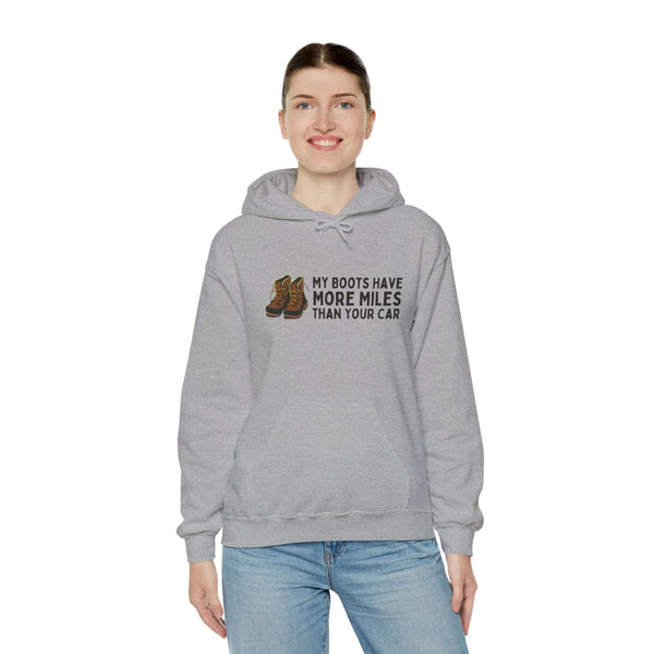 Unisex gray hoodie with the text 'My Boots Have More Miles Than Your Car' for hikers and outdoor enthusiasts.