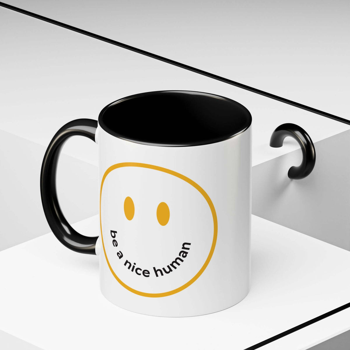 Be a Nice Human Mug with hand-drawn smile and contrasting black handle, perfect for daily use.