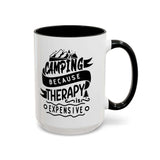 Camping Because Therapy Is Expensive mug with bold text and mountain design on a white background.