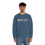 A model wearing the Made in the Northwest Sweatshirt, showcasing regional pride and adventure spirit.