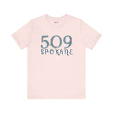 Cream floral 509 Spokane area code soft tee for women, embodying Pacific Northwest style with elegant nature-inspired design.