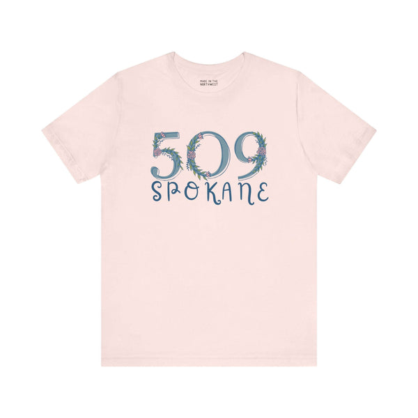 Cream floral 509 Spokane area code soft tee for women, embodying Pacific Northwest style with elegant nature-inspired design.