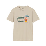 People in Vancouver Don't Tan, They Rust T-shirt featuring a gnome with an umbrella, ideal for Pacific Northwest wear.
