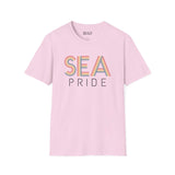 Pride in SEA Rainbow Softstyle T-Shirt in light pink featuring vibrant rainbow city lettering.