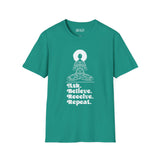 Teal softstyle t-shirt featuring the text 'Ask. Believe. Receive. Repeat.' and a graphic of a meditative woman.
