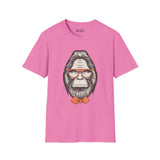 Gentleman of the Woods Bigfoot softstyle t-shirt with bowtie and glasses on pink fabric.