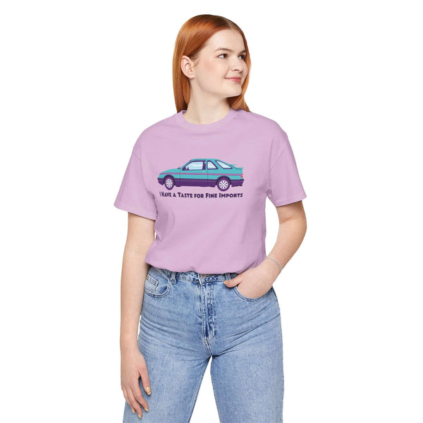 Model wearing I Have a Taste for Fine Imports tee featuring 80s Merkur XR4TI in a stylish purple design.