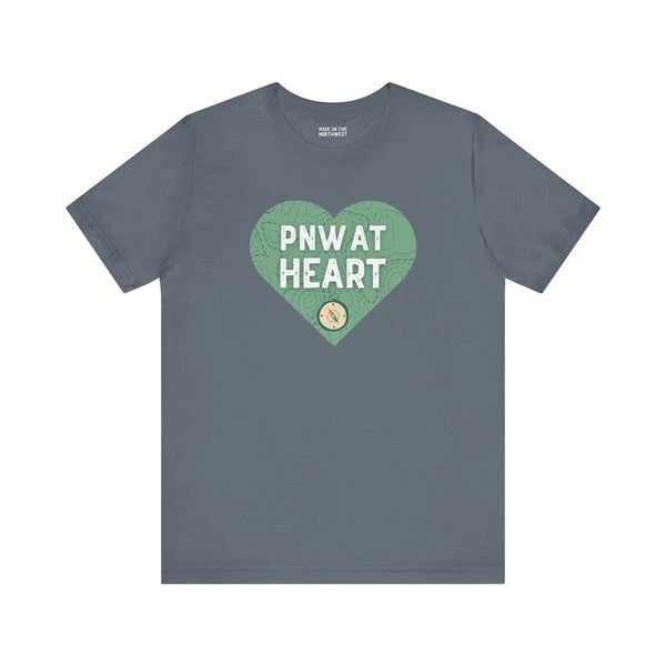 Grey "PNW at Heart" tee with compass graphic symbolizing Pacific Northwest adventures and pride.