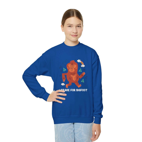 Kid wearing blue sweatshirt with 'I Brake for Bigfoot' design, perfect for adventurous outdoor play.