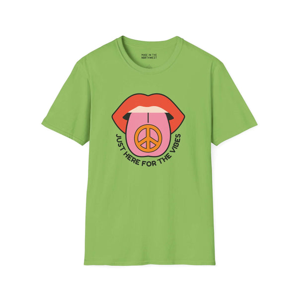 I'm Just Here for the Vibes softstyle t-shirt featuring a playful graphic on a green background.